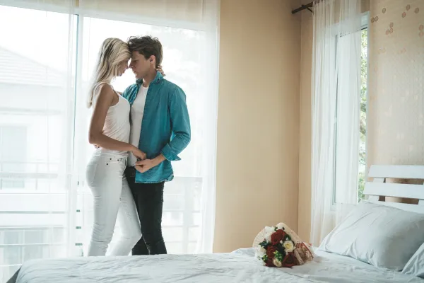 happy-couple-playing-together-in-the-bedroom-2025-01-16-15-47-21-utc-691599f2de626