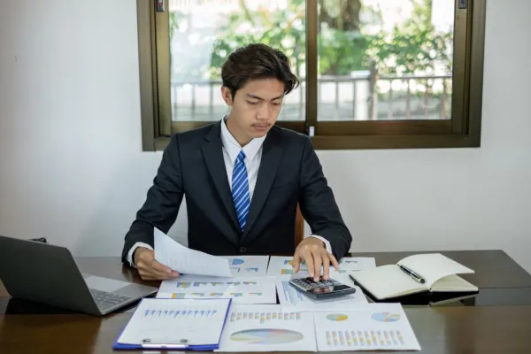 young-asian-businessman-financial-market-analyst-s-2025-01-10-15-05-12-utc1-684e0187dba65