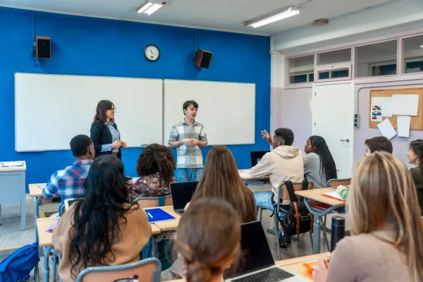high-school-student-giving-presentation-in-classro-2025-08-11-04-27-38-utc-69319030ca486