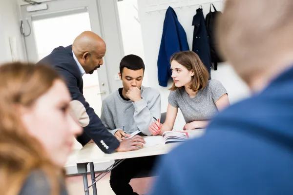 students-16-17-and-teacher-in-classroom-2024-10-18-05-31-58-utc-693195350c622