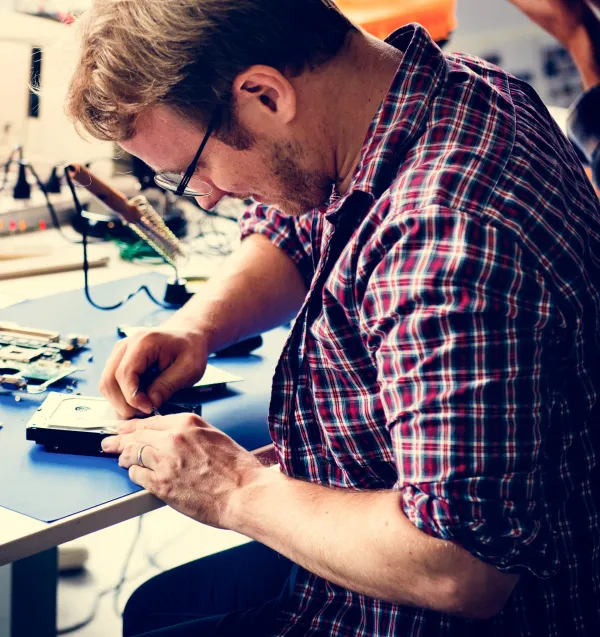 technicians-working-on-computer-hard-disk-2026-03-18-09-56-07-utc-69e0d20accefd