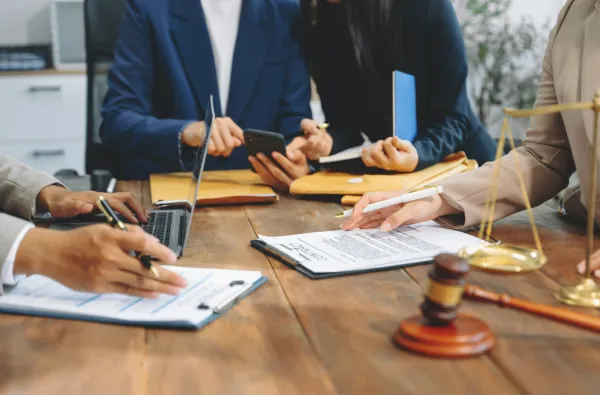 business-people-and-lawyers-discussing-contract-pa-2026-01-05-23-24-47-utc-695d0c8dd9568
